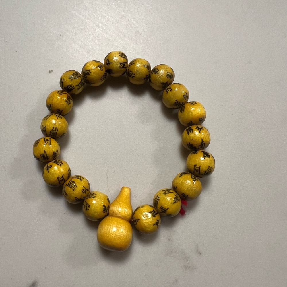 Yellow Beaded Bracelet with Unique Charm